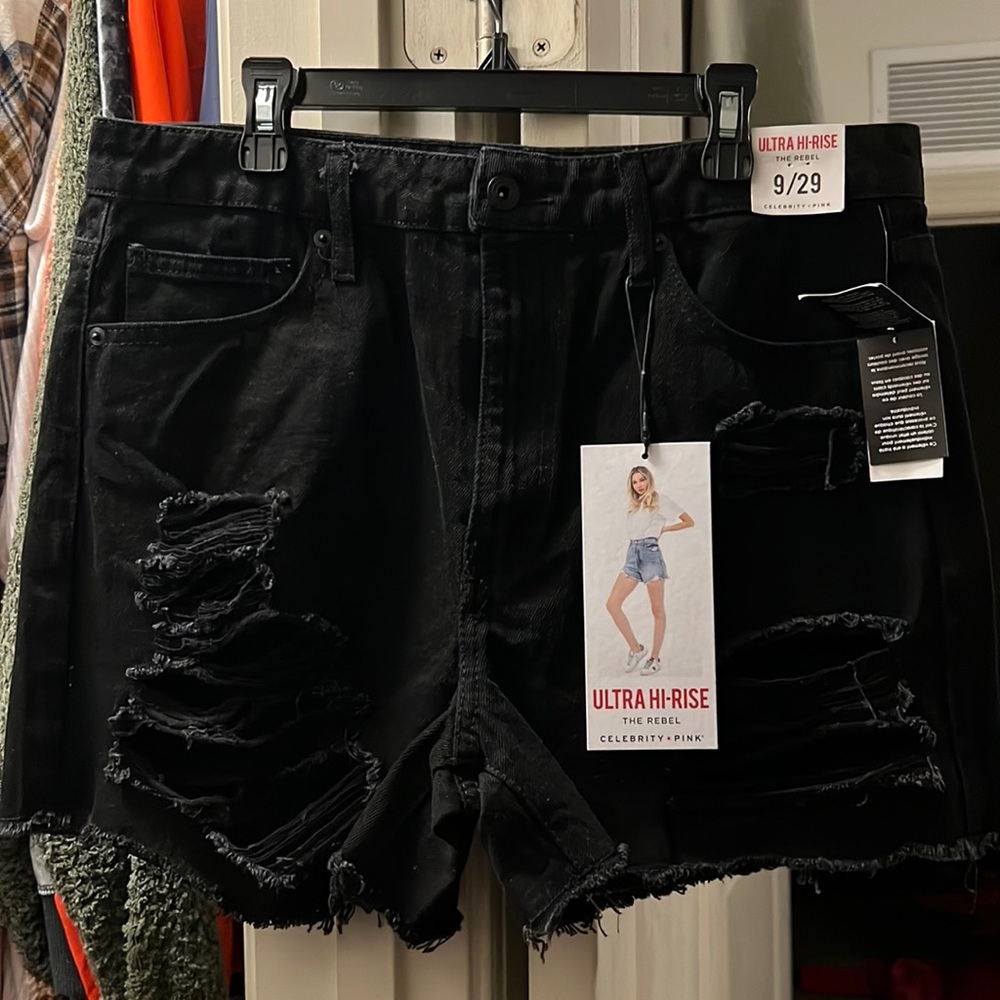 Brand new black distressed shorts size (9)